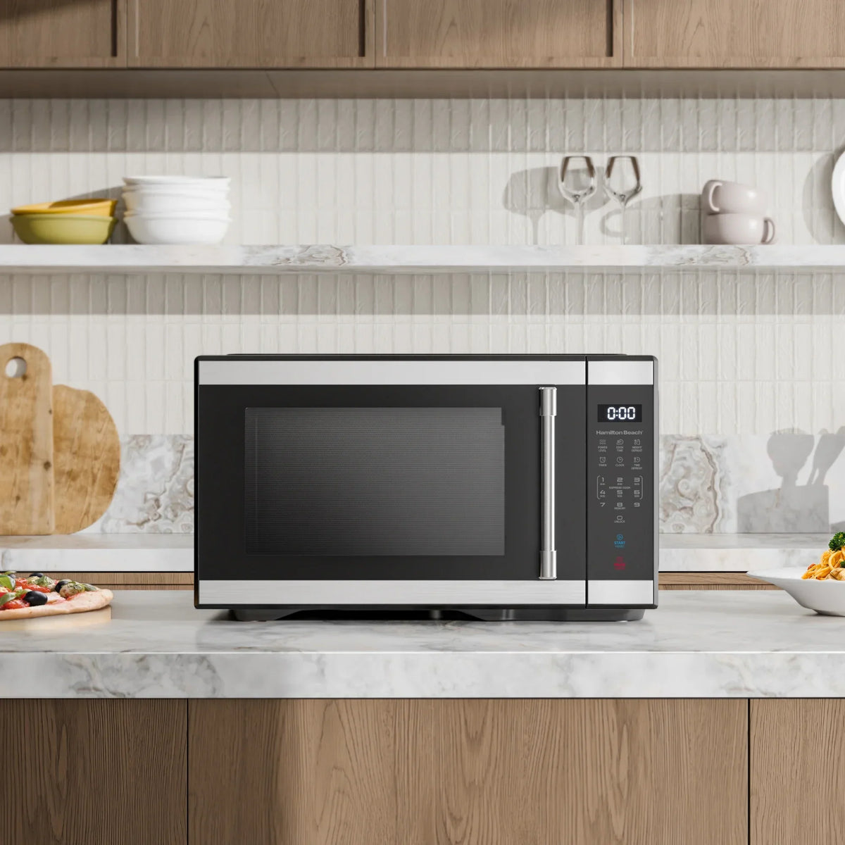 Nouveauté 2026 – Four à micro-ondes de comptoir Hamilton Beach , 1,1 pi³, noir et acier inoxydable