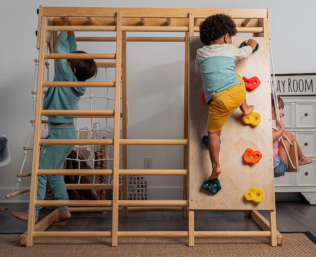 Nouveauté 2026 – Avenlur Aire de jeux intérieure pour tout-petits et enfants - Structure en bois véritable 6 en 1 avec toboggan, mur d'escalade, corde à grimper, barres de singe, balançoire et échelle. Un espace de jeux amusant pour les enfants