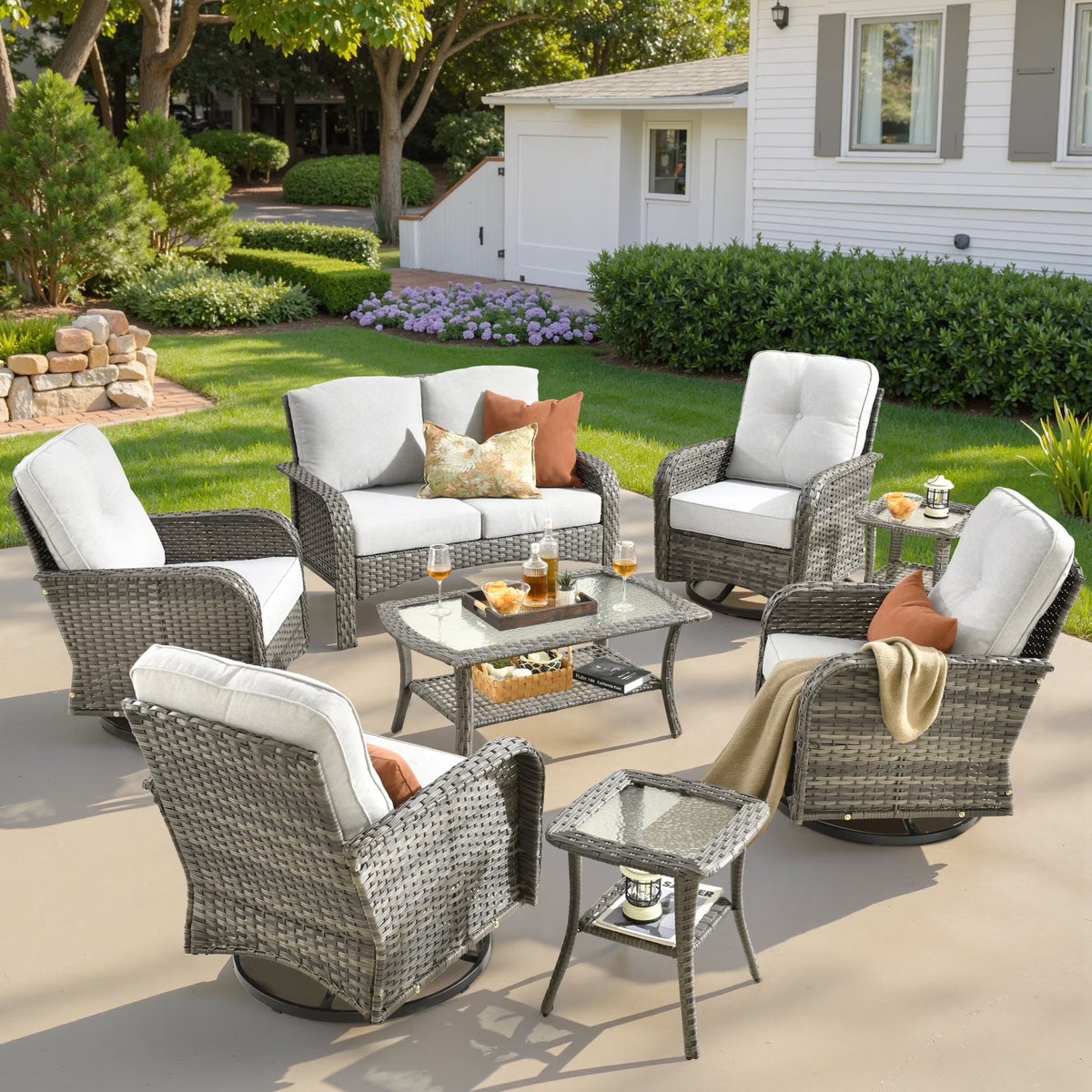 Nouveauté 2026 – Ensemble de mobilier de jardin 5 pièces Ovios , comprenant fauteuils pivotants et table basse, en résine tressée résistante aux intempéries, gris foncé