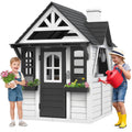 Nouveauté 2026 – Maisonnette d'extérieur COCLUB pour enfants de 4 à 8 ans, en bois, avec sonnette, téléphone et jouets de cuisine. Dimensions : 114 cm (L) x 165 cm (H). Couleurs : blanc et noir