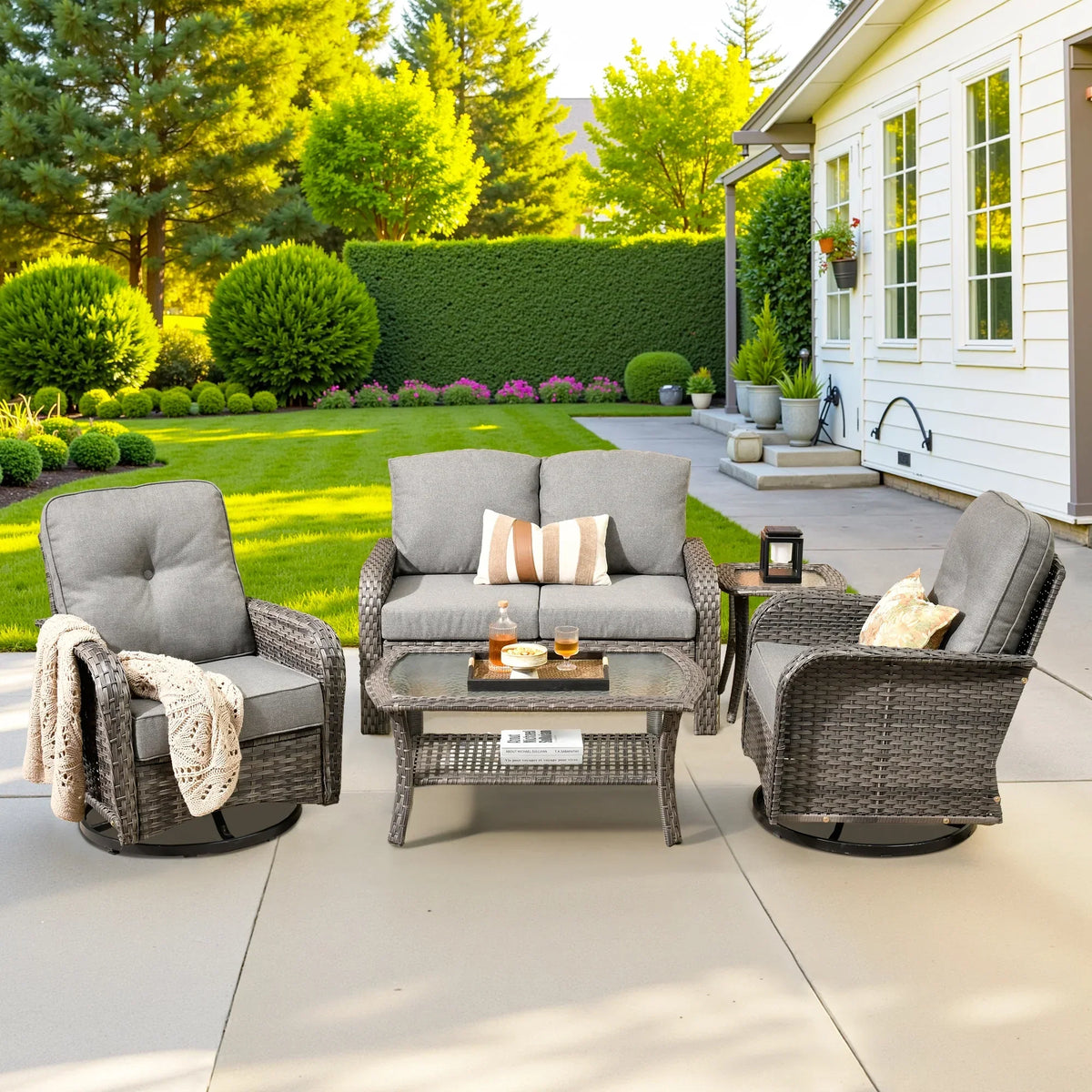 Nouveauté 2026 – Ensemble de mobilier de jardin 5 pièces Ovios , comprenant fauteuils pivotants et table basse, en résine tressée résistante aux intempéries, gris foncé