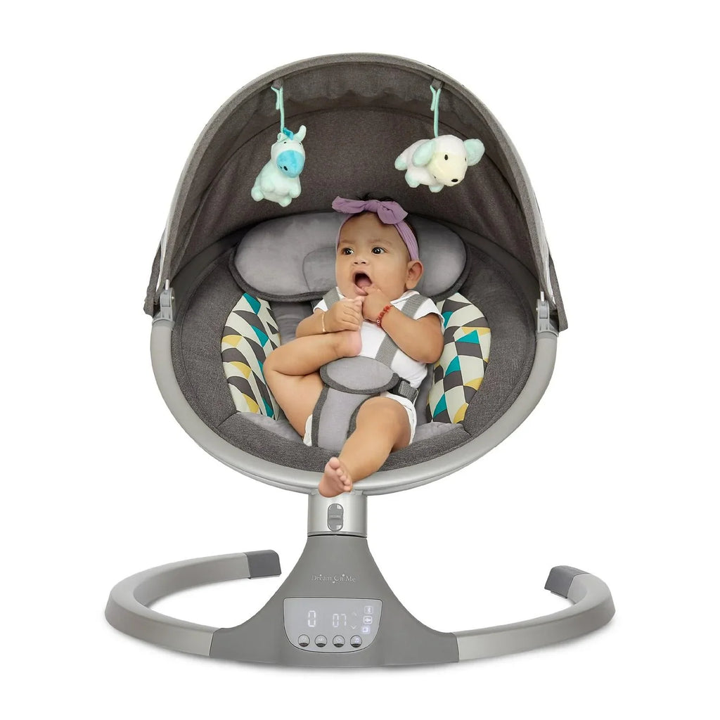 Nouveauté 2026 – Balancelle pour bébé Dream On Me Zazu . Balancelle pour nourrisson. 5 vitesses de balancement. Deux jouets intégrés. Connectivité Bluetooth et télécommande. Gris et bleu