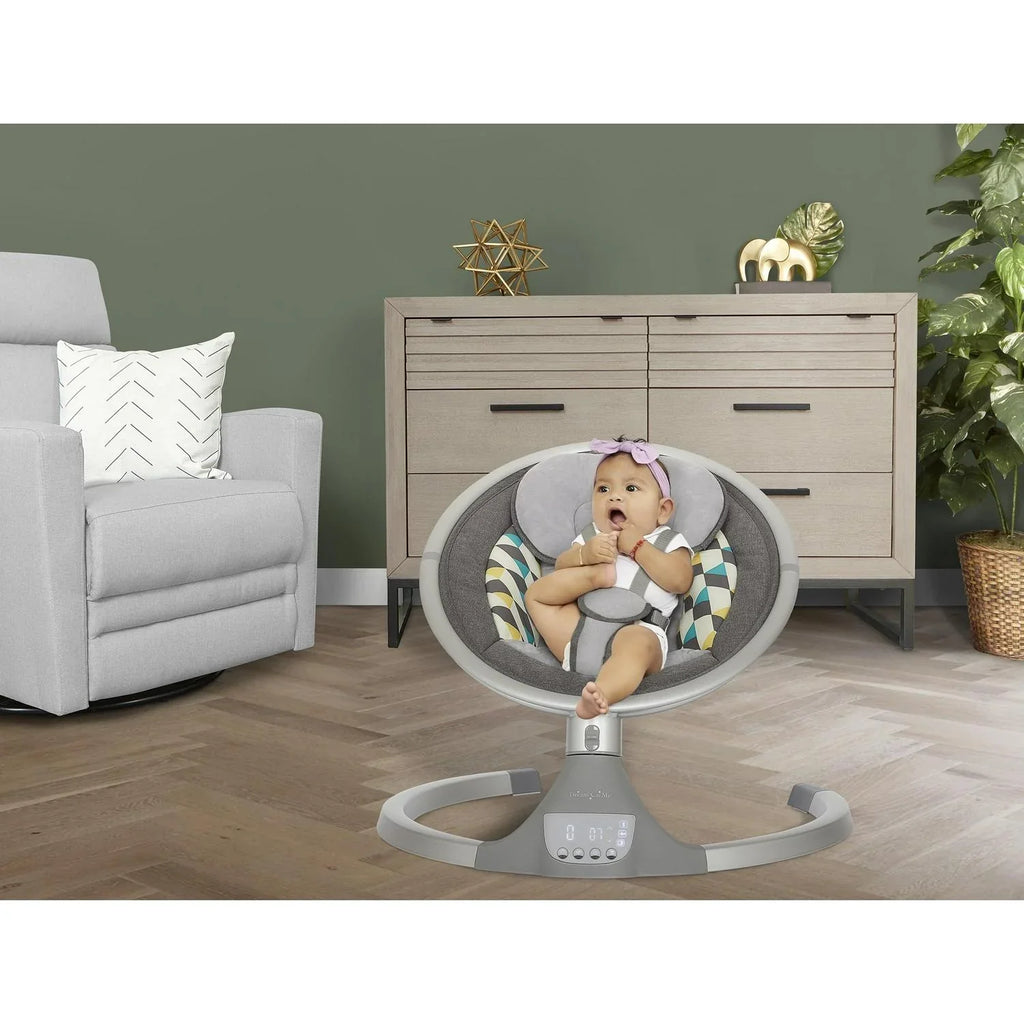 Nouveauté 2026 – Balancelle pour bébé Dream On Me Zazu . Balancelle pour nourrisson. 5 vitesses de balancement. Deux jouets intégrés. Connectivité Bluetooth et télécommande. Gris et bleu